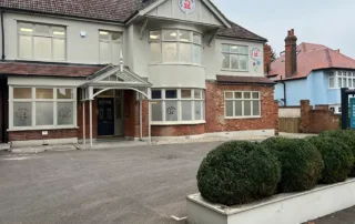 front of Monkey Puzzle Woodford